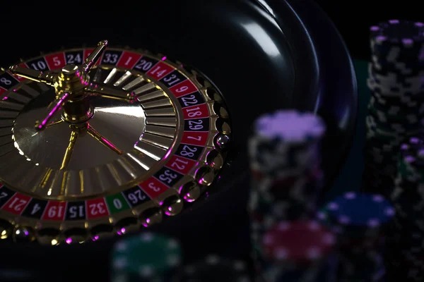 Live dealer conducting Indonesia Lottery draw with number board displayed on camera